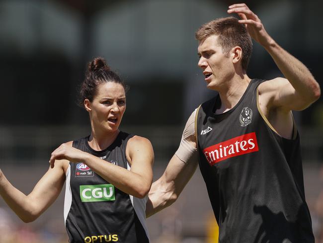 Sharni Layton and Mason Cox train together at Collingwood. Picture: AAP