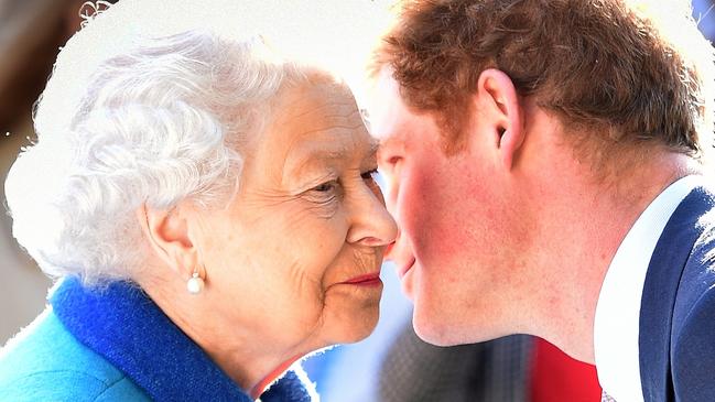 Prince Harry, seen here with the Queen in 2015, says it is too dangerous for his family to visit the UK. Picture: Getty