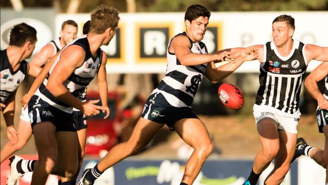 Jesse McKinnon earns a clearance against Port Adelaide in the SANFL. His form for Victor Harbor has been paramount to the club’s finals push. Picture: Nick Hook.