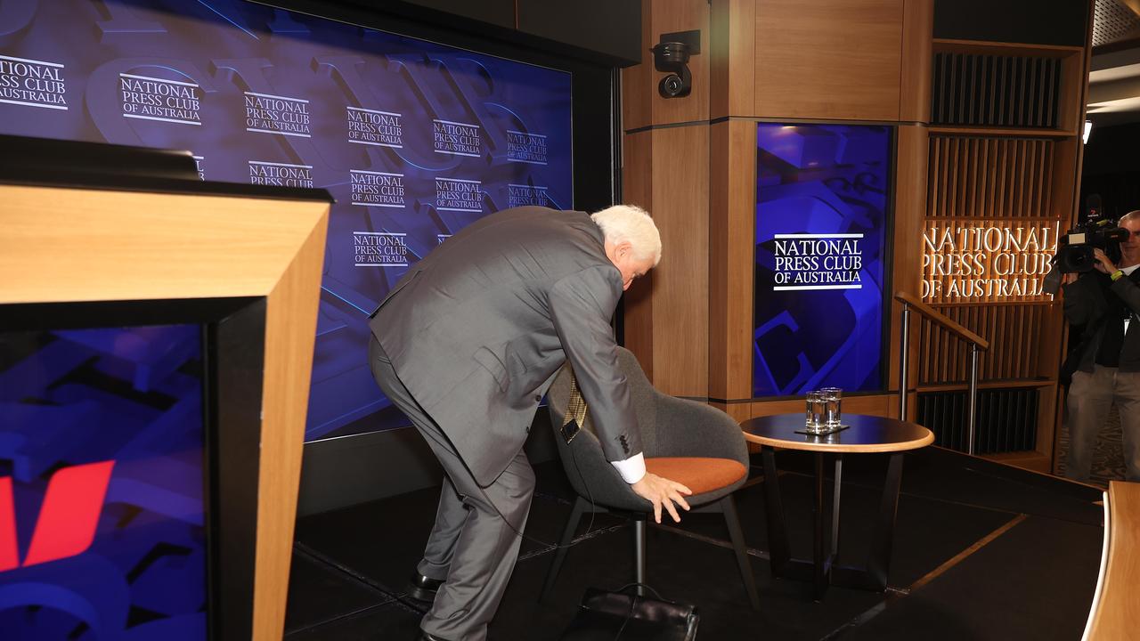 Clive Palmer stumbled as he left the stage after he spoke at the National Press Club in Canberra. Picture: NCA NewsWire / Gary Ramage