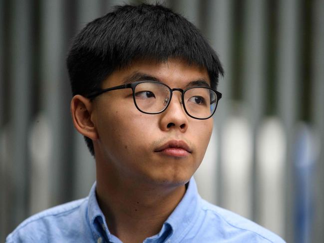 Pro-democracy activist Joshua Wong has been campaigning to protect Hong Kong’s freedoms since he was 12 years old but is painted by Beijing as a “black hand”. Picture: AFP