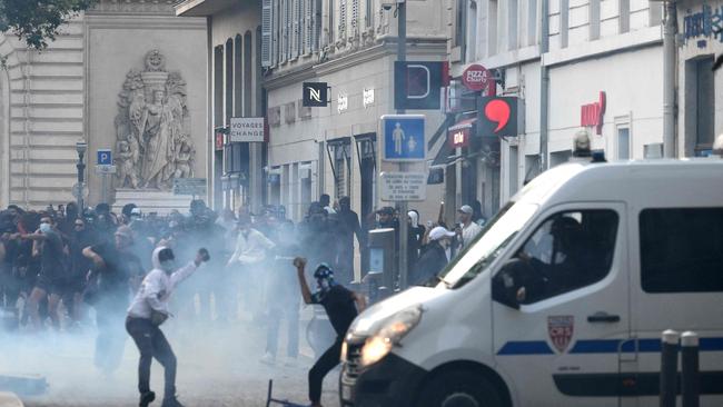 Protesters clash with CRS riot police in Marseille, southern France over the shooting of the teenage driver by French police. Picture: AFP