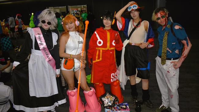 Gojo Satoru Maid Outfit (happy birthday), Nami, Luffy, Ace and Nanami at the Melbourne Oz Comic Con Xmas edition, held at the Melbourne Convention &amp; Exhibition Centre on Saturday, December 7, 2024. Picture: Jack Colantuono