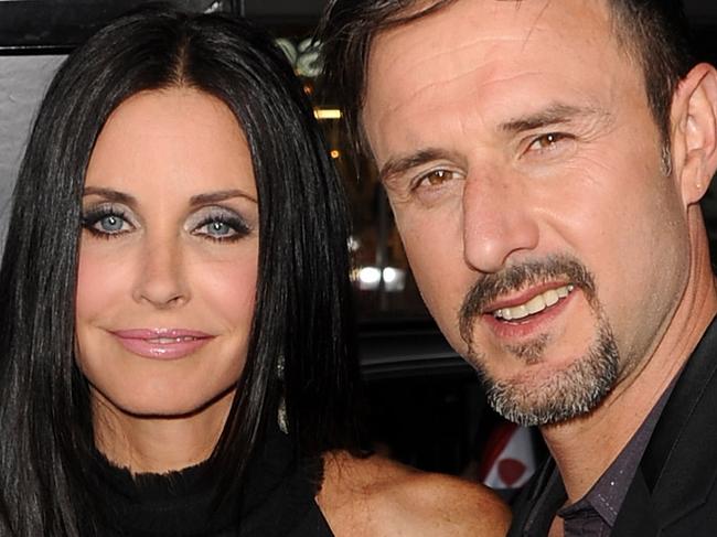 HOLLYWOOD, CA - APRIL 11:  Actors Courteney Cox (L) and David Arquette arrive at the premiere of The Weinstein Company's "Scream 4" Presented by AXE Shower held at Grauman's Chinese Theatre on April 11, 2011 in Hollywood, California.  (Photo by Kevin Winter/Getty Images)