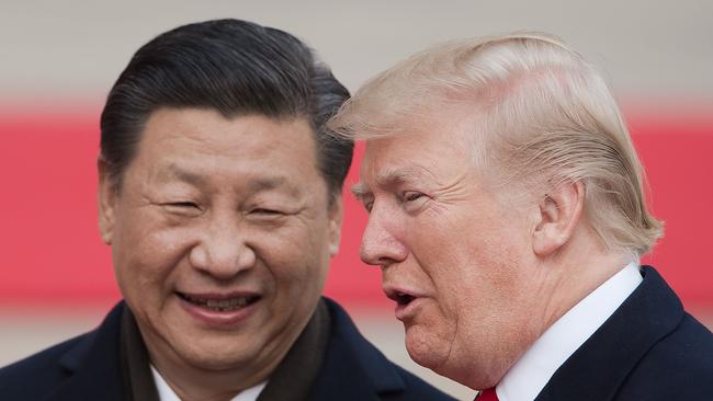 China's President Xi Jinping and US President Donald Trump attend a welcome ceremony at the Great Hall of the People in Beijing in 2017.