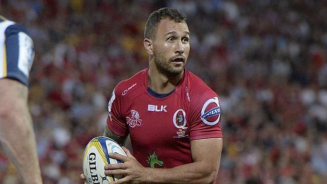 BRISBANE, AUSTRALIA - APRIL 11: Quade Cooper of the Reds looks to pass during the round n