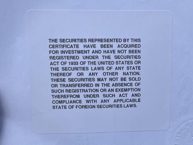 The odd disclaimer stuck on the back of everyone’s certificate.