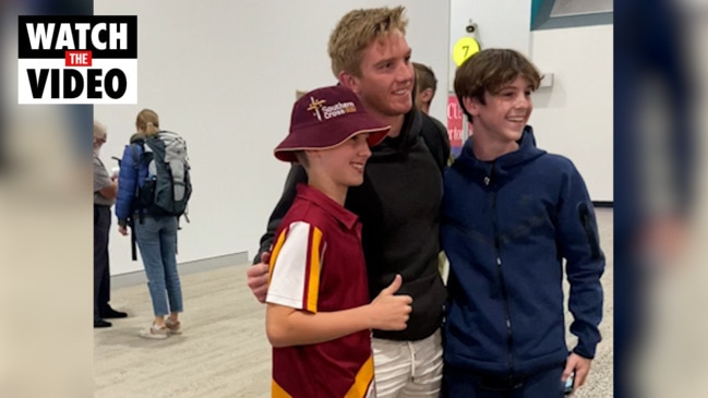 Cowboys' origin stars arrive home