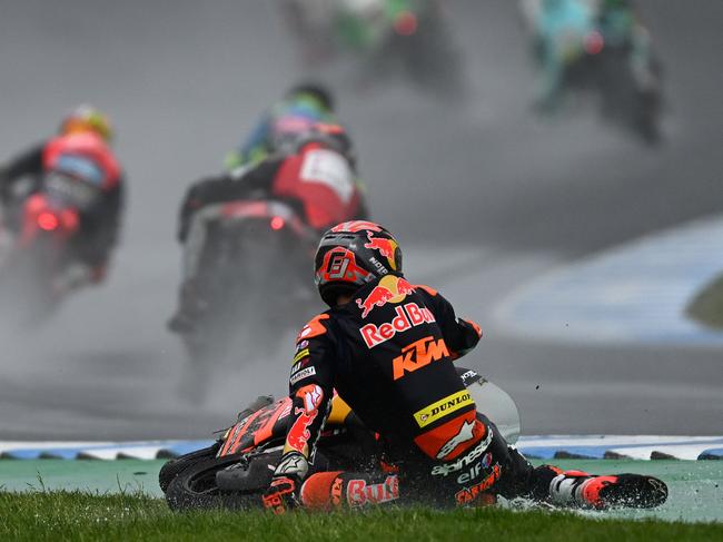 PHILLIP ISLAND, AUSTRALIA - OCTOBER 22: Filippo Farioli of Italy and the Red Bull KTM Tech3 Team crashes in the Moto 3 race during the MotoGP of Australia - Sprint Race at Phillip Island Grand Prix Circuit on October 22, 2023 in Phillip Island, Australia. (Photo by Quinn Rooney/Getty Images)