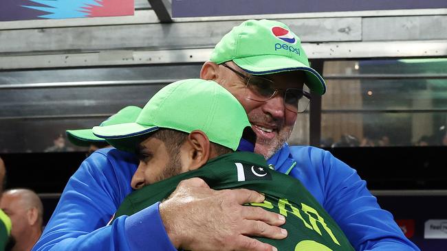 Babar Azam of Pakistan celebrates with Matthew Hayden after winning the ICC Men's T20 World Cup Semi Final match between New Zealand and Pakistan at Sydney Cricket Ground on November 09, 2022 in Sydney, Australia. (Photo by Matt King-ICC/ICC via Getty Images)