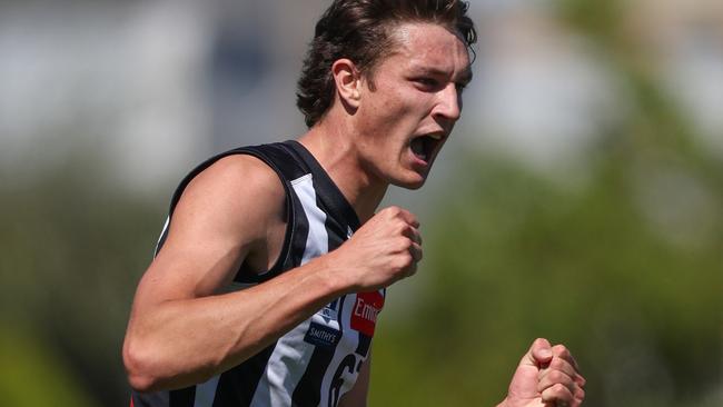 Riley Mason celebrates a goal for Collingwood against Sydney in Round 1. Photo by Rob Lawson/AFL Photos