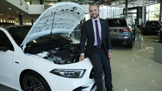 Mercedes Benz sales executive Shaun Hutton with an A250e hybrid model in Alexandria in Sydney. Picture: Britta Campion