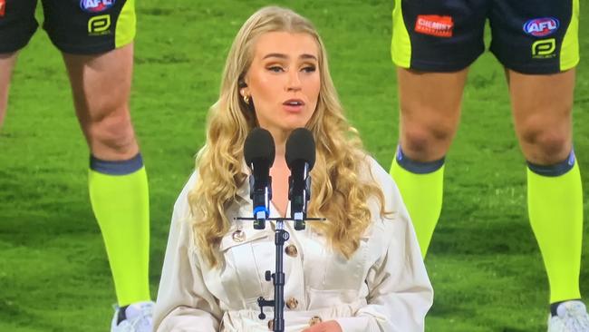 Liliya Butonova singing the national anthem pre-match. Photo: Fox Footy