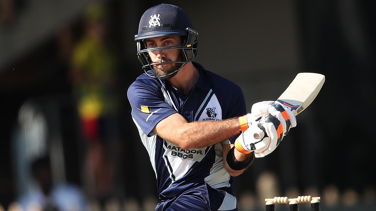 Glenn Maxwell shapes to play a switch hit.