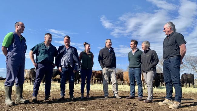 Left to right: Pomborneit farmer Sam Wilson, Australian Dairy Farmers president Ben Bennett, Rural Assistance Commissioner Peter Tuohey, Bookaar farmer Sam Andrew, Australian Dairy Farmers chief executive Steve Sheridan, Agriculture Victoria chiefs Dougal Purcell and Beth Jones and United Dairyfarmers of Victoria president Bernie Free in a drought-hit paddock between Colac and Camperdown.