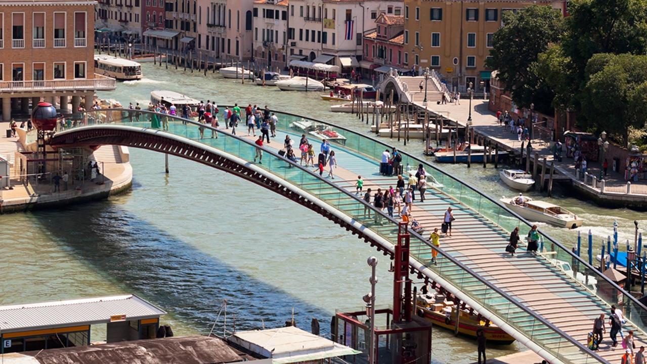 Venice cityscape and The Constitution Bridge (Ponte della Costituzione) over the Grand Canal from above.