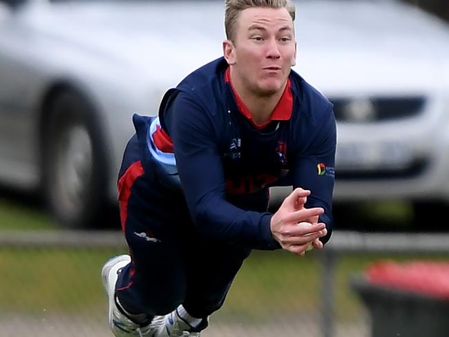 Ed Newman takes a spectacular catch for Dandenong last season.