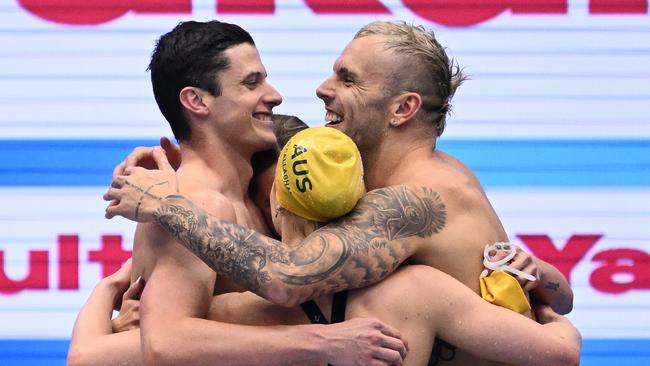 Australia’s medley relay world champions embrace. Picture: Quinn Rooney/Getty Images