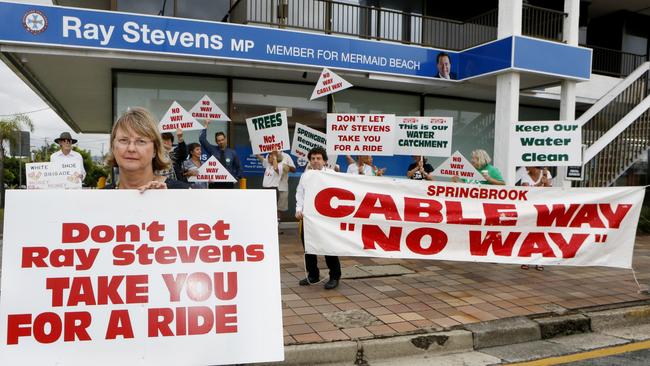 Ceris Ash and opponents of the cableway project staged a pop up rally outside the MP Ray Steven’s office this week. Picture: JERAD WILLIAMS