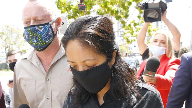 Maria Carmel Pau is surrounded by media after her court appearance. Picture: Tertius Pickard