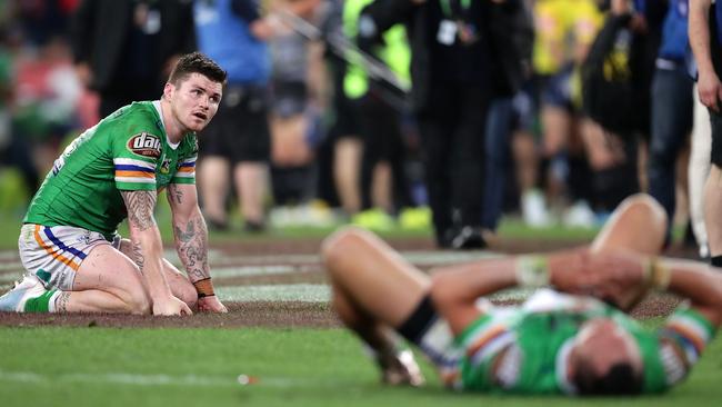 The Raiders collapsed in despair at fulltime. Photo by Mark Metcalfe/Getty Images.