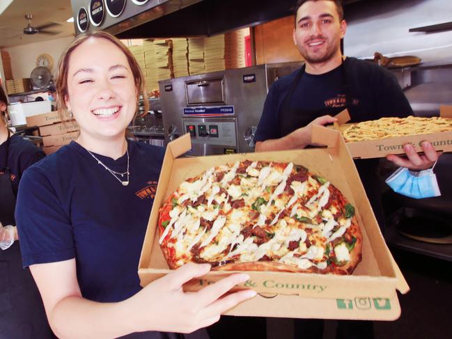 Hayley Clark, Mai Blake and Birtan Tankir celebrate being voted back-to-back best pizzazeria. Town and Country Waurn Ponds has taken out our Best Pizza Vote for the second year in a row. Picture: Alan Barber