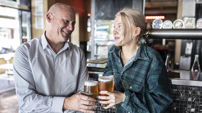 Staff member Nyah Clarke and Licensee Ian Vaughan share a beer ahead of the Telegraph Hotels closure this month. Picture Eddie Safarik