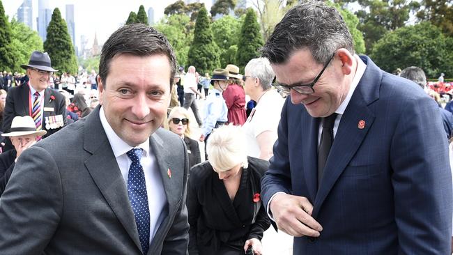 Opposition Leader Matthew Guy, left, and Premier Daniel Andrews at a Remembrance Day ceremony in Melbourne. Picture: NCA NewsWire / Andrew Henshaw