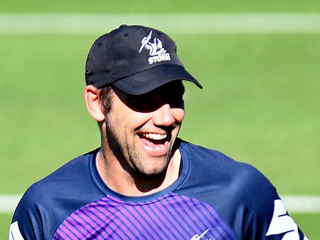 SUNSHINE COAST, AUSTRALIA - JUNE 29: Cameron Smith shares a laugh with his team mates during a Melbourne Storm NRL training session at Sunshine Coast Stadium on June 29, 2020 in Sunshine Coast, Australia. (Photo by Bradley Kanaris/Getty Images)