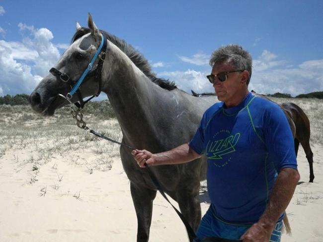 Sir Ravanelli and trainer Terry Evans at Tuncurry beach