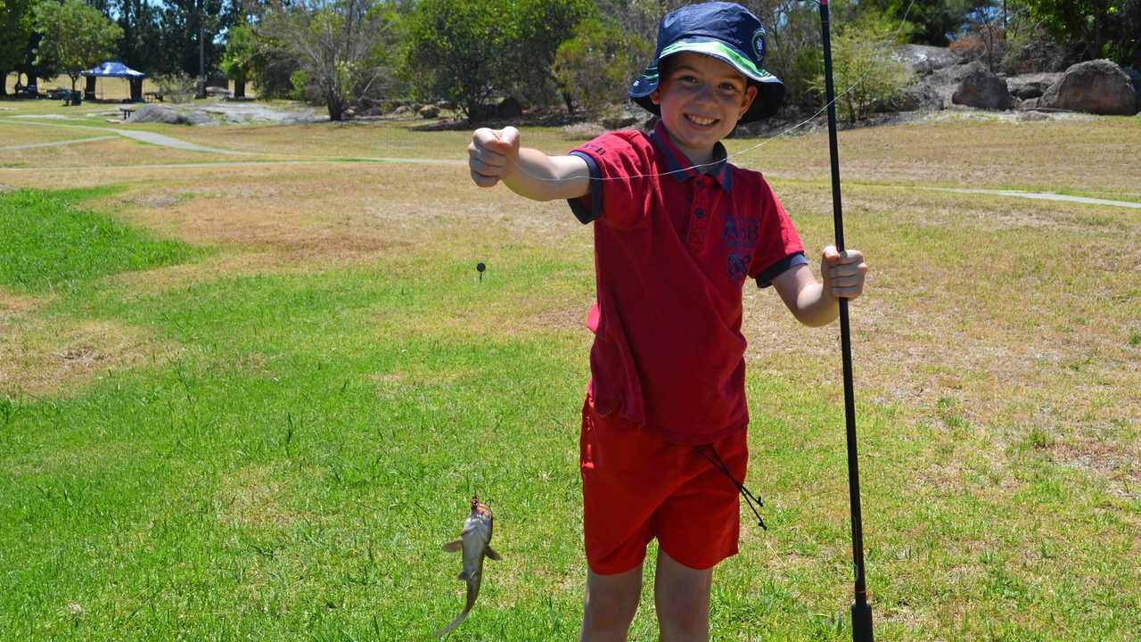Youngsters learn to wet a line at the creek