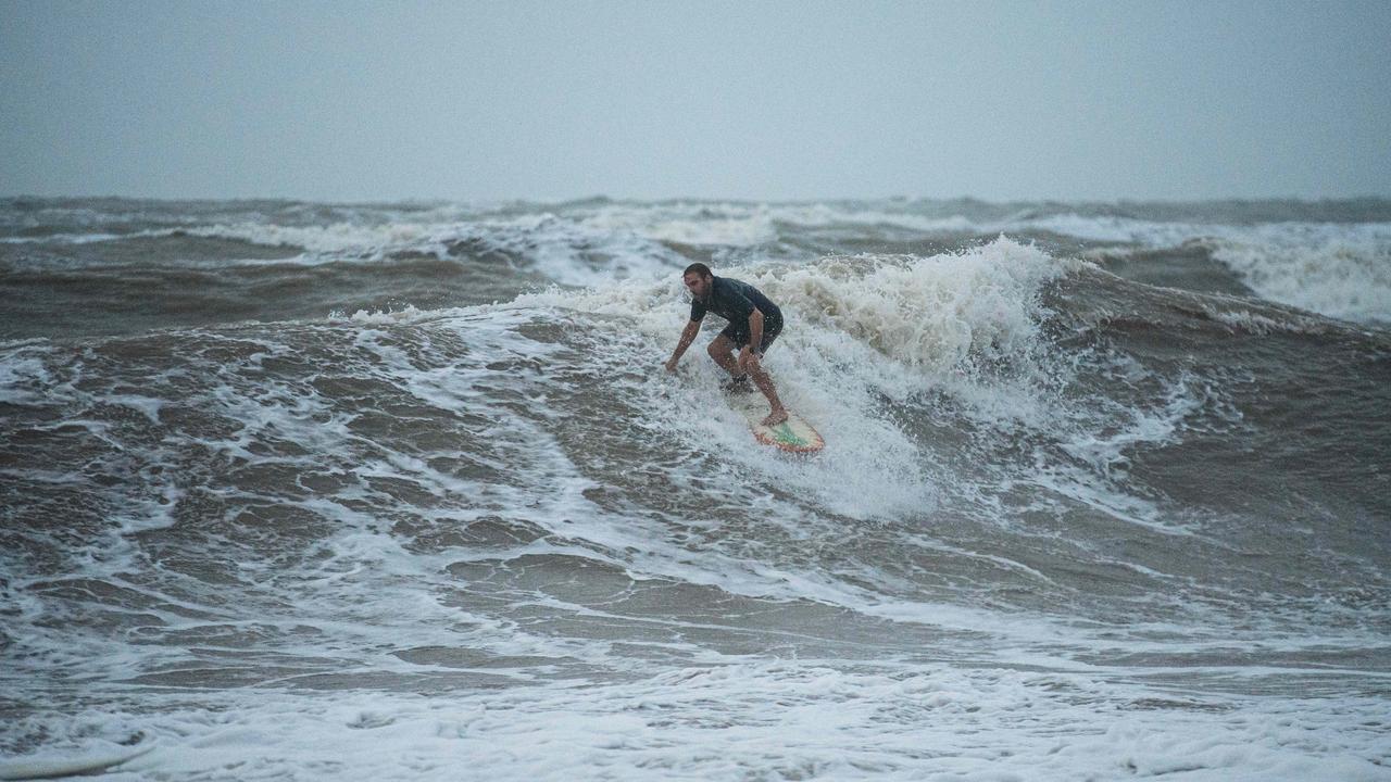 Top End Monsoon Surfing at the Nightcliff Beach, Darwin. Picture: Pema Tamang Pakhrin