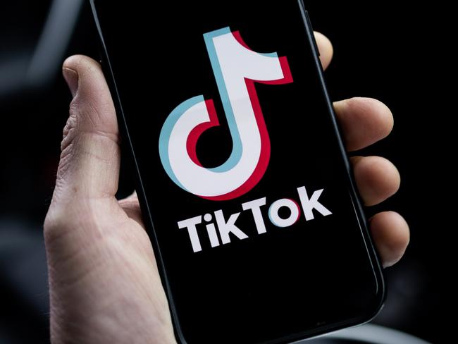 LONDON, ENGLAND - FEBRUARY 28: In this photo illustration, a TikTok logo is displayed on an iPhone on February 28, 2023 in London, England. This week, the US government and European Union's parliament have announced bans on installing the popular social media app on staff devices. (Photo by Dan Kitwood/Getty Images)