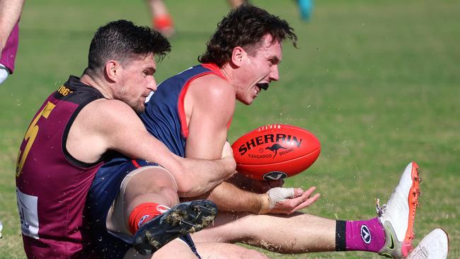 Old Haileybury midfielder Brede Seccull (L) will miss the match due to a hamstring injury.