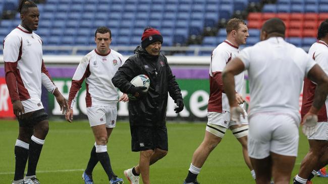 England coach Eddie Jones gives instructions to his players during training at the Yokohama International Stadium. Picture: AP