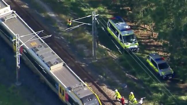 Emergency services on the scene after a train got stuck on the line near Yatala. Picture: QAS.