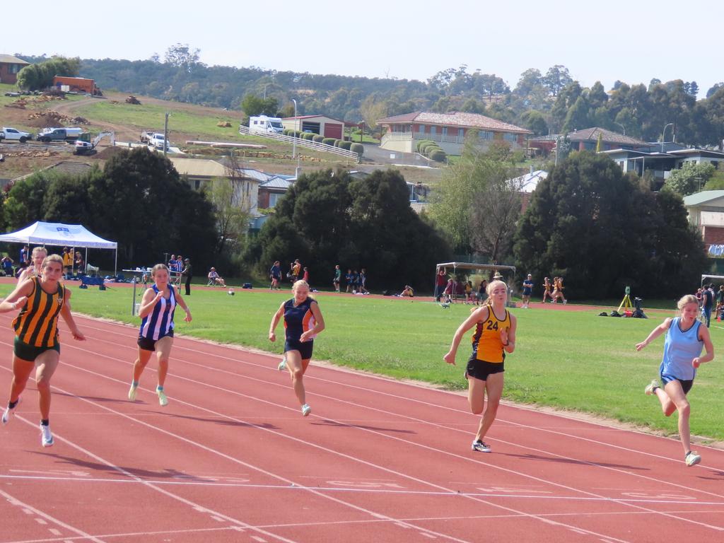 Athletes compete in the under-16 100m. Picture: Jon Tuxworth