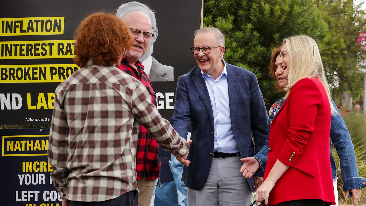 Prime Minister Anthony Albanese and his fiancee Jodie Haydon greet Labor candidate Jodie Belyea at Derinya Primary School in Frankston South. Picture: NCA NewsWire / Ian Currie