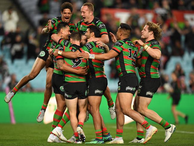 The Rabbitohs celebrate John Sutton's try during the Round 25 NRL match between the South Sydney Rabbitohs and the Wests Tigers at ANZ Stadium in Thursday, August 30, 2018. (AAP Image/Dean Lewins) NO ARCHIVING, EDITORIAL USE ONLY