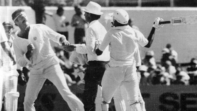 Umpire Tony Crafter tries to calm down the Javed Miandad-Dennis Lillee spat.