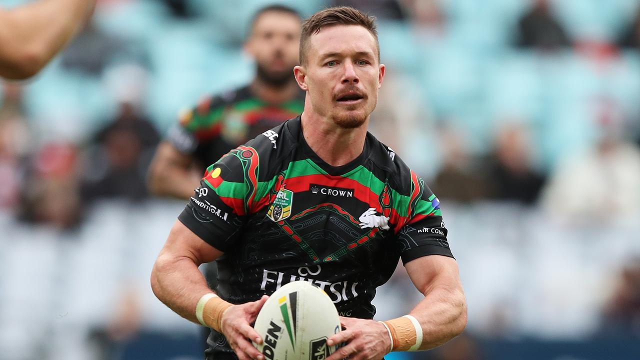 Souths Damien Cook on the fly against the Dragons.
