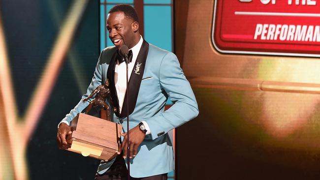 Draymond Green accepts his Defensive Player of the Year trophy at the NBA Awards. Picture: Getty Images
