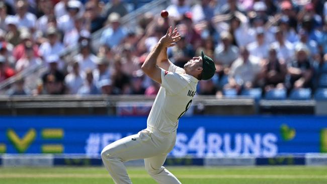 Australia's Mitchell Marsh takes a catch to dismiss England's Mark Wood. Picture: AFP