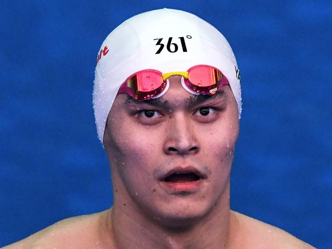 (FILES) In this file photo taken on July 22, 2019 China's Sun Yang reacts after competing in a heat for the men's 200m freestyle event during the swimming competition at the 2019 World Championships at Nambu University Municipal Aquatics Center in Gwangju, South Korea. - China's triple Olympic swimming gold medallist Sun Yang has been found guilty of refusing to give a doping sample and banned for eight years in an eagerly-awaited judgement from the Court of Arbitration for Sport (CAS) on February 28, 2020. (Photo by Ed JONES / AFP)