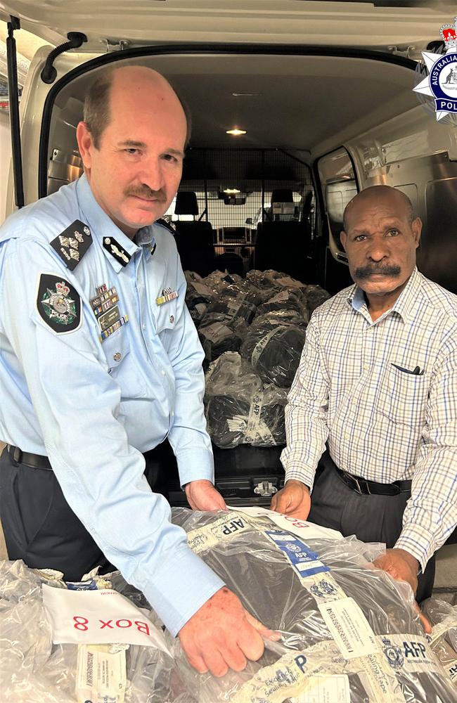 Royal Papua New Guinea Constabulary (RPNGC) Deputy Commissioner Donald Yamasombi and AFP Commander Stephen Jay. Photo: Australian Federal Police