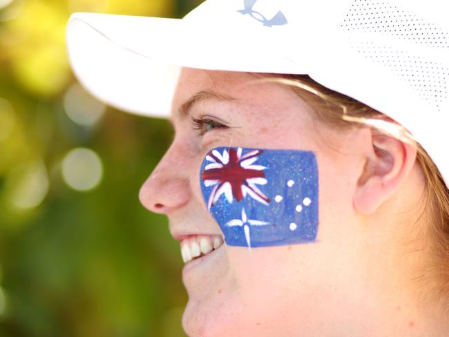 MELBOURNE, AUSTRALIA - JANUARY 19:  A tennis fan is seen with the Australian flag painted on her face on day four of the 2017 Australian Open at Melbourne Park on January 19, 2017 in Melbourne, Australia.  (Photo by Ryan Pierse/Getty Images)