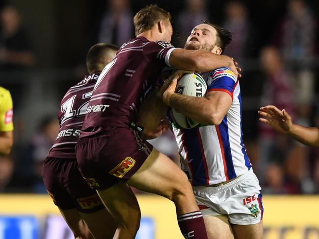 High tackles are in the firing of the new NRL crackdown. Picture: AAP Image/David Moir