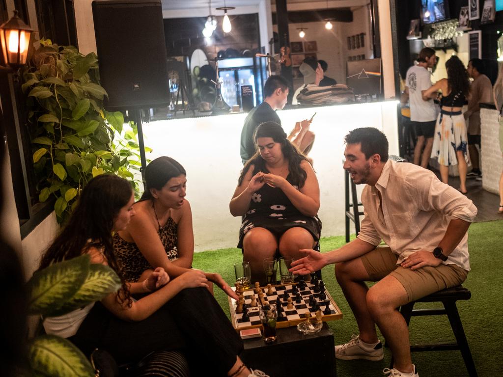 Foreign tourists play chess at a bar in Canggu, Bali, Indonesia. Photo: Getty Images