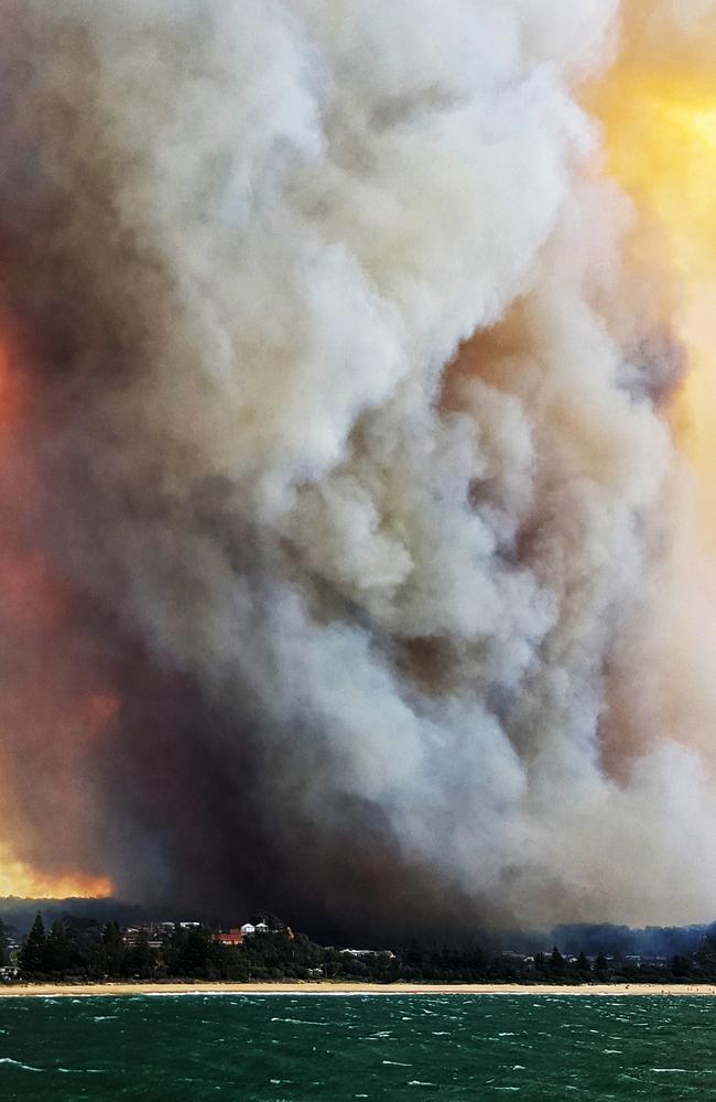 The fire, seen from Tathra Wharf looking back to Tathra township. Picture: Katrina Walsh