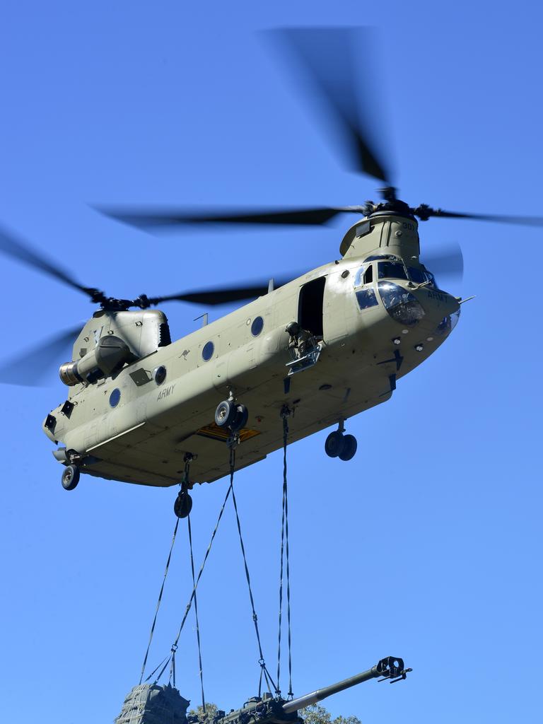 CH47 Chinook helicopter lifts artillery gun The Advertiser